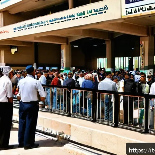 Home 17 팔레스타인과 요르단 국경 통과 절차 - A detailed scene of a busy international border crossing between Palestine and Jordan during dayligh...